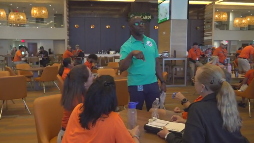 Miami Dade College professor finds his passion with side job at Hard Rock Stadium — CBS Miami, Denton Arts news